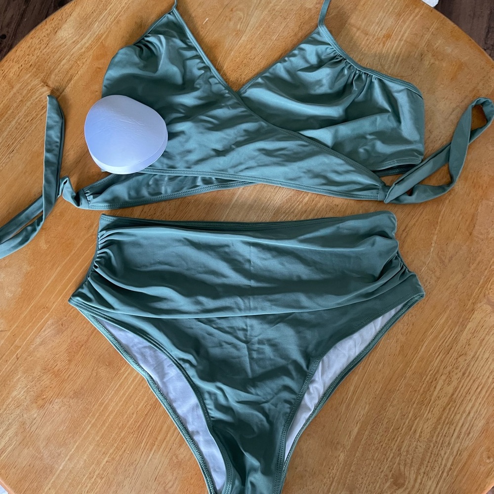 High waisted bathing suit in a green with wrap around top